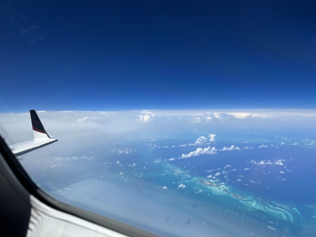 A view of the ocean from an airplane window.